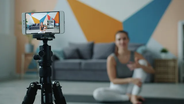 Female fitness vlogger using smartphone to record a session in stylish living room. Is that fitness post an advert? CMA labelling rules, the offer, children and a health-claim evidence file
