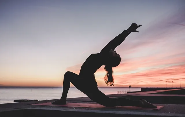 yoga, outdoors, nature, sunrise, meditation, fitness, workout, exercise, woman, twilight, dusk. What a fitness creator contract needs to say about claims, disclosure and rights